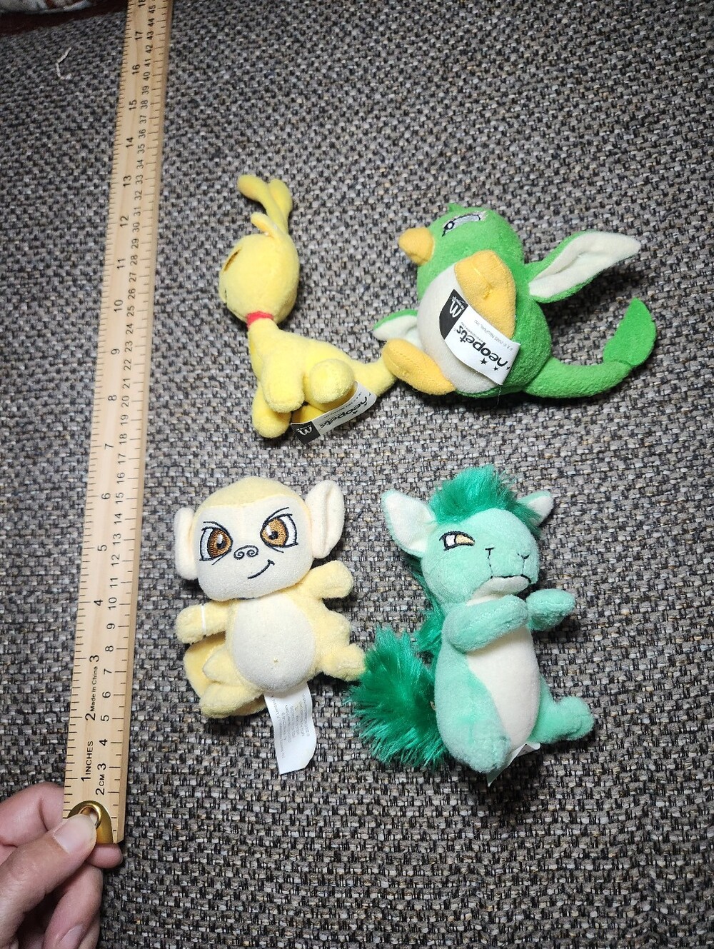 four vintage McDonald's Neopets promotional plush toys